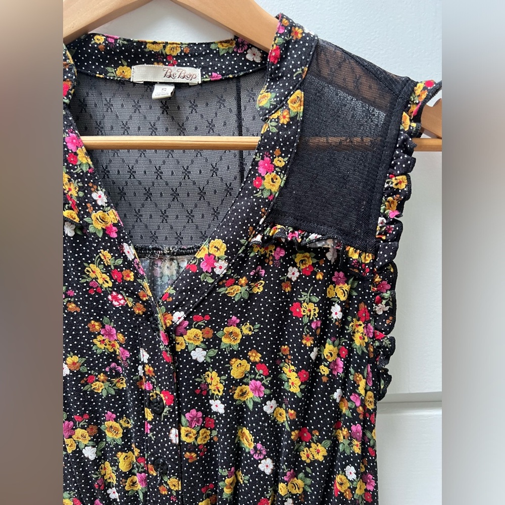 BeBop beautiful black flowered and white dot dress with waist tie in size small.